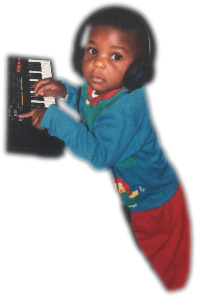 Major Seven as a child at the keyboard